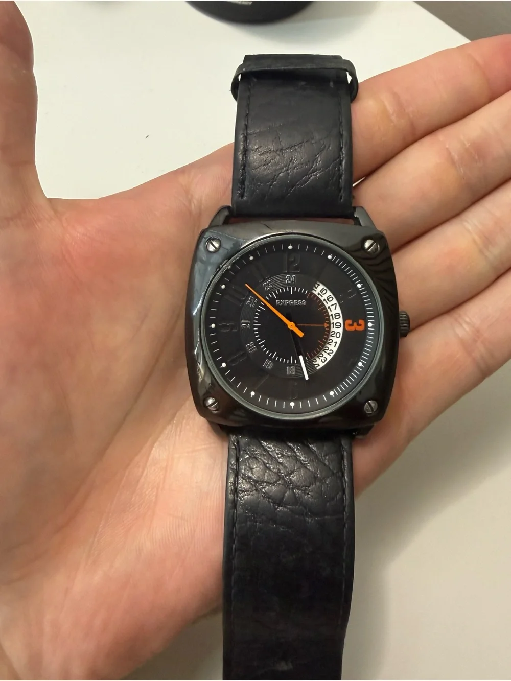 Express Black Watch with Orange Accents